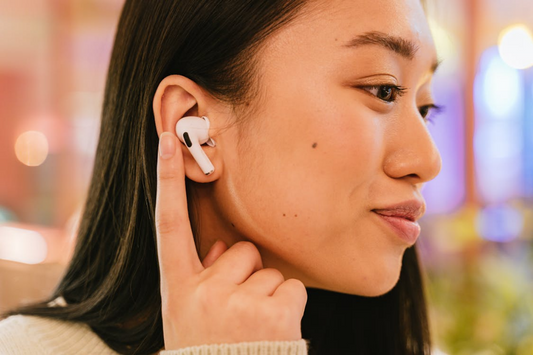 person-using-true-wireless-earbuds