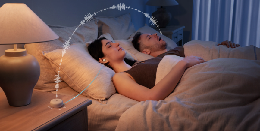 Couple sleeping with sleep headphones and white noise for sleep